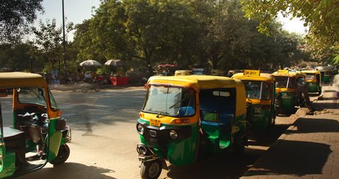 New Delhi, Delhi/India - December 16, 2015: Time lapse of auto rickshaws in New Delhi, India.
