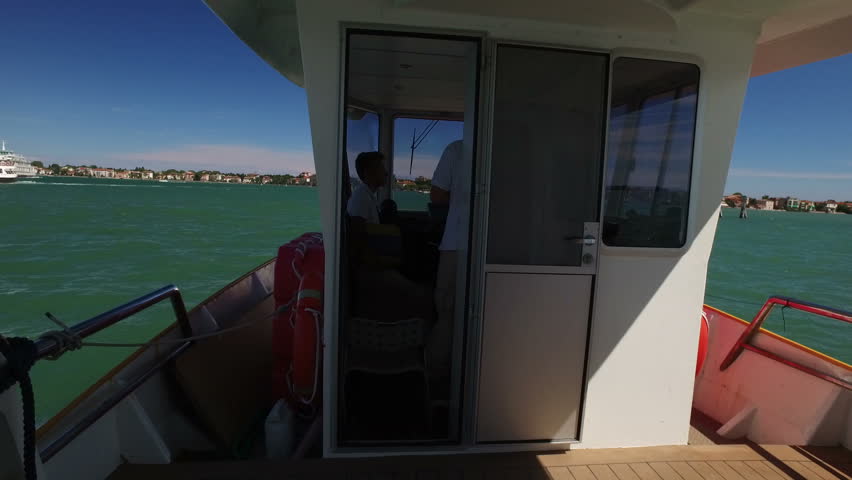 Public transport boat in Venice, Italy. Venetian lagoon. Boats is the main public transport in Venice, architecture view