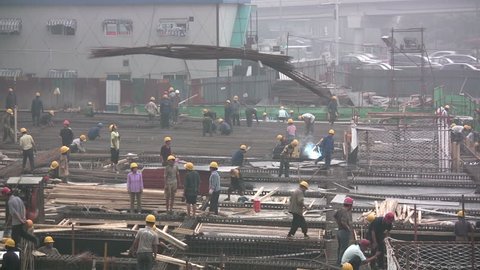 People are at work at a construction site in Beijing, China