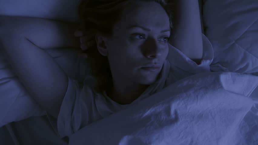 Insomnia concept. Woman in bed at night can not sleep Royalty-Free Stock Footage #23820751