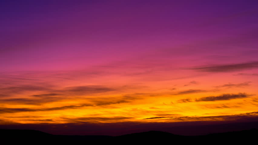 Wispy airy cirrus sparse clouds day to night time lapse. Billow disappear midair cloud scape. Mid air aero ozone stratosphere timelapse. Purple orange red sunset sky. Fantastic golden hour sky roll 4K Royalty-Free Stock Footage #23830780