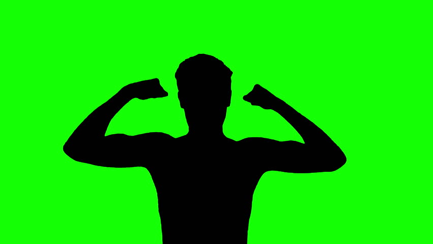 Silhouette of a young man showing his muscles