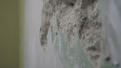 Smashing through concrete wall in slow motion