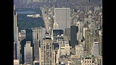 New York, United States of America - circa 1970: vintage panorama from Empire State Building top floor, aerial view of Top of The Rock, Rockefeller Center and Central Park.