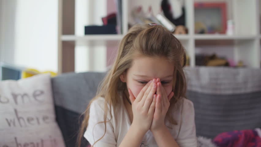 Little girl coughing at home Royalty-Free Stock Footage #23854357