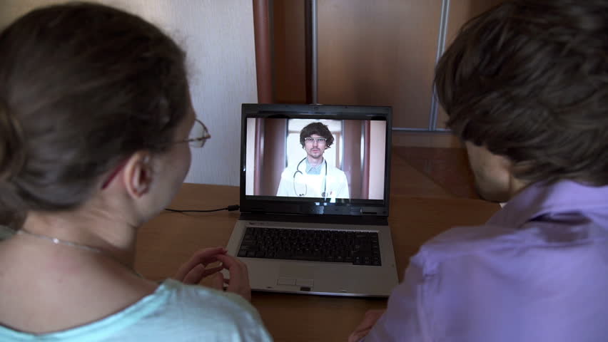 Man and woman talking with doctor on laptop | Shutterstock HD Video #23860495