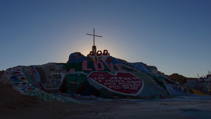 Timelapse of sunrise over Salvation Mountain in Slab City, California -Long Crop-