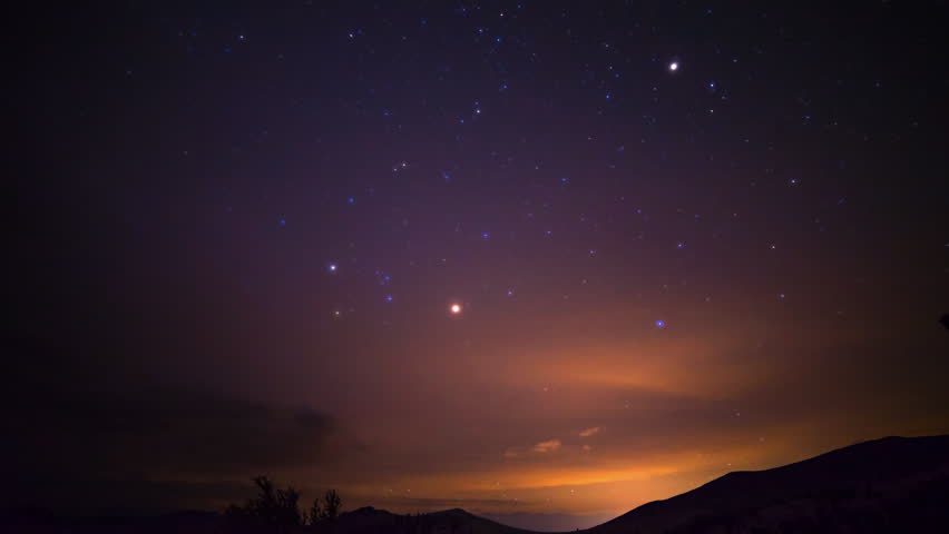 Astrophotography timelapse with zoom in motion of milky way galaxy over White Mountain in California