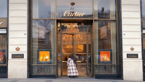 PARIS - JAN 27: Cartier luxury jewelry boutique flagship store open for business on January 27, 2017. Known for jewellery and watches, Cartier jewelers company was founded in Paris, France in 1847. 