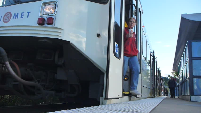 PORTLAND - CIRCA JUNE 2012: Time lapse of metro train, MAX, traveling on rail,