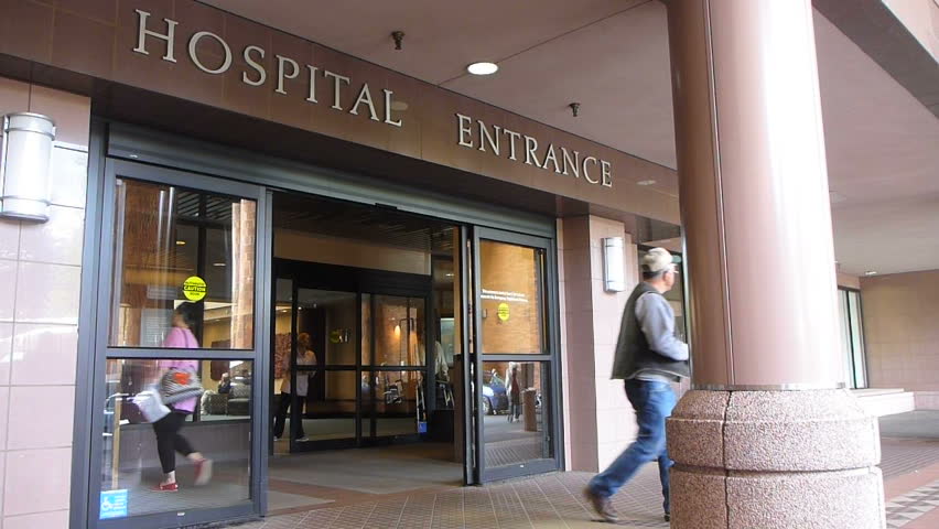 PORTLAND - CIRCA JUNE 2012: Time lapse of patients entering and exiting through