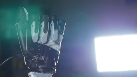 Bionic arm. Innovative robotic hand made on 3D printer. Futuristic technology.
