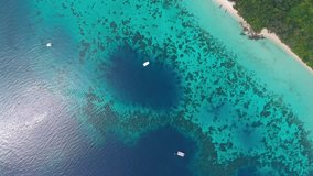 Top view aerial video of beauty nature landscape with beach, corals and sea on Koh Rok island, Thailand, 4k