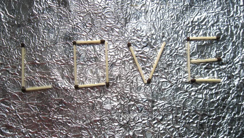 Word love made from matches burns grunge style stop motion animation