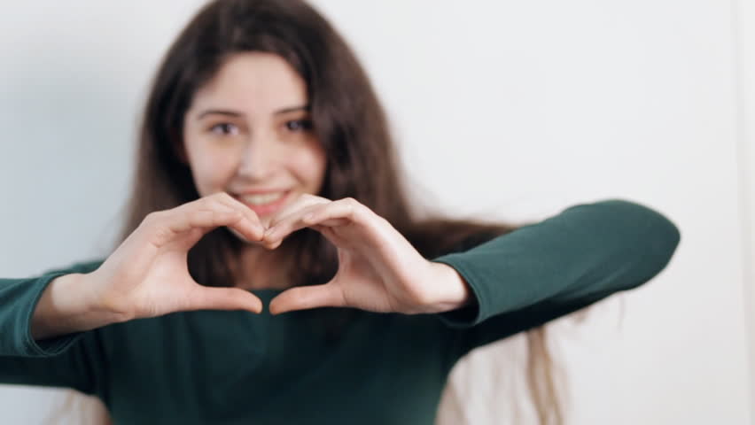 Woman Making Love Heart Gesture Stock Footage Video 100 Royaltyfree