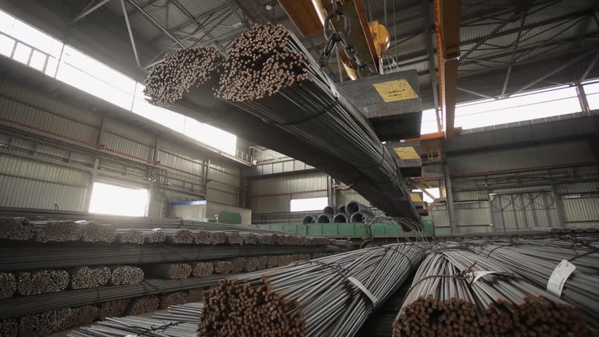 industrial magnet placing steel bars inside the warehouse medium shot Royalty-Free Stock Footage #23902759