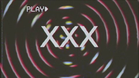 VHS retro fake shot: the text XXX appears over a set of spinning circles with a lens flare at the beginning. Grindhouse low-budget b-movie style.
