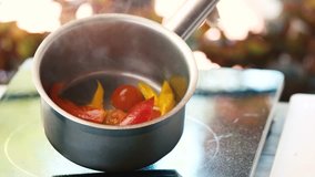 Vegetables in saucepan. Boiled tomatoes and pepper. How to cook vegetarian soup. - Powered by Shutterstock - Get 15% off with code: PIKWIZARD15