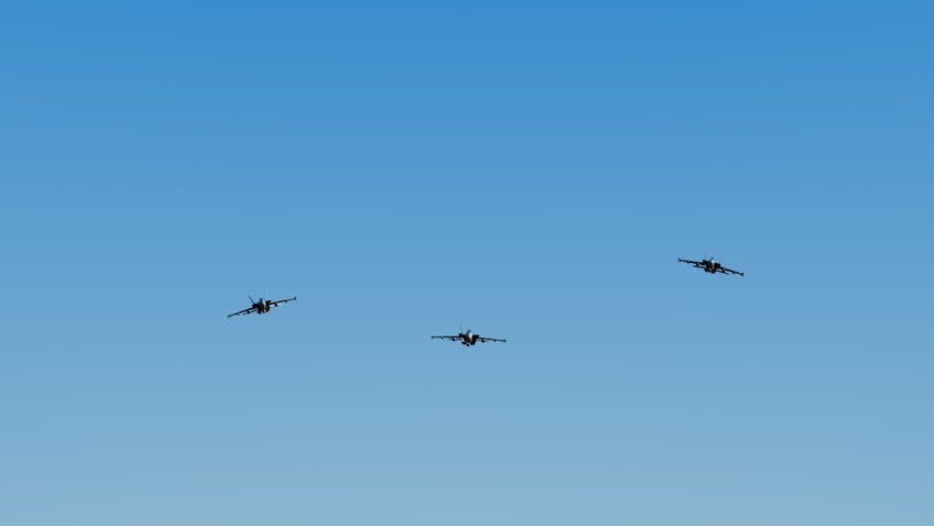 Three F18 Hornet fighter jets fly directly at the camera. (3d animation)
