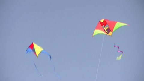two kites on sky 