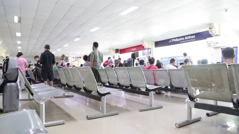 MANILA,PHILIPPINES-CIRCA  DECEMBER  2016  unidentified people waiting and walking inside the gate of airport  

