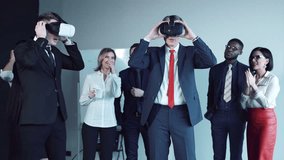 Two businessmen trying on helmets of virtual reality during the meeting. - Powered by Shutterstock - Get 15% off with code: PIKWIZARD15