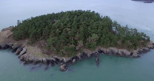 Aerial footage video over the forest island. 4 k . Edited