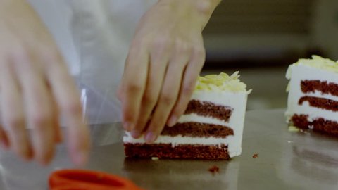Woman wraps a slice of cake