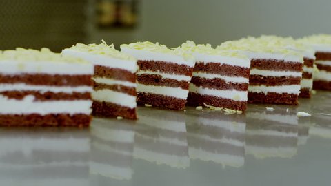 Slices of cake are standing on the table
