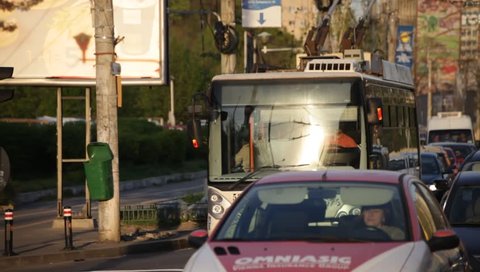 ROMANIA, BUCHAREST – APRIL 16 2016: Trolleybuses are a convenient and popular way of public transportation among local commuters.