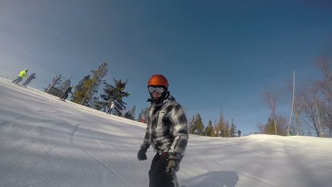 professional snowboarder creating snow cloud riding Stock Footage Video ...