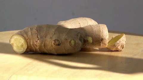 Close up of ginger root used for cooking ingredients rotating slowly
