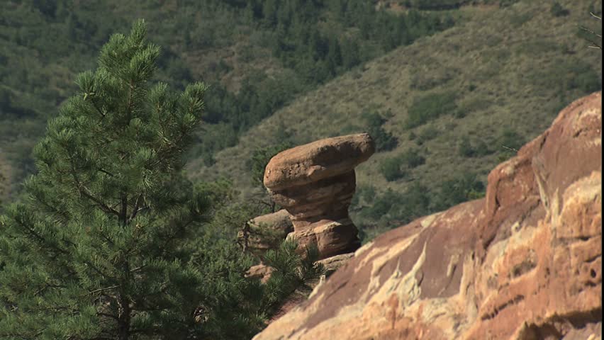 MORRISON, CO - CIRCA 2002: Balanced rock and tourists taking pictures.