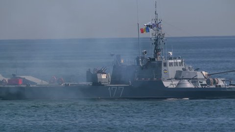 CONSTANTA, ROMANIA - AUGUST 15, 2016: Fast Attack Missile Craft military boat at Navy Marine Day. Navy Day make presentations of combat equipment and weapons in the military Black sea port