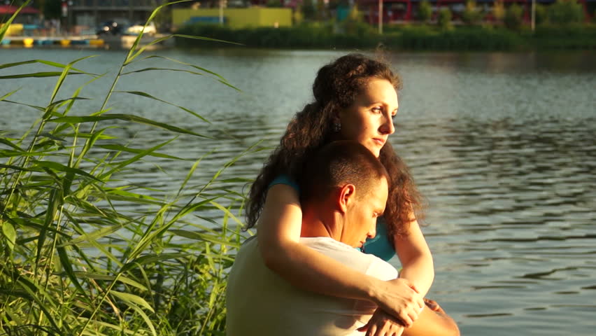 Couple in lover young adult near water