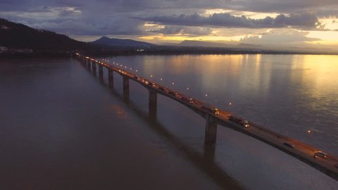 Aerial view nisunset of The Second Thai-Lao Friendship Bridge across the Mekong River linking northeastern Thailand in Mukdahan province with central Laos in Savannakhet province.