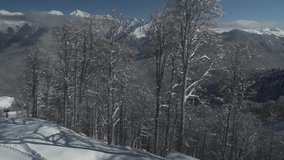 Ski slopes on North slope Aibga Ridge of the Western Caucasus at Rosa Khutor Alpine Resort stock footage video
