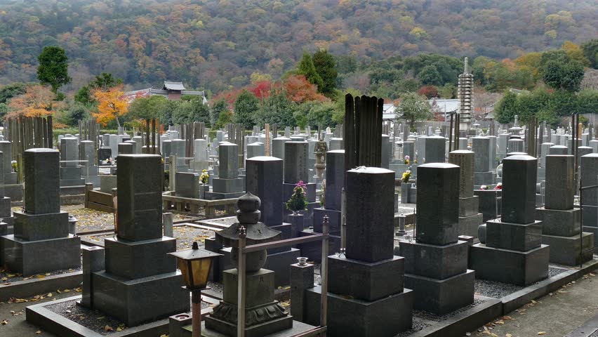 Traditional graveyard with graves and tombs near the Bamboo Forest or Arashiyama Bamboo Grove, tourist site and attraction in Kyoto, Japan, Asia
