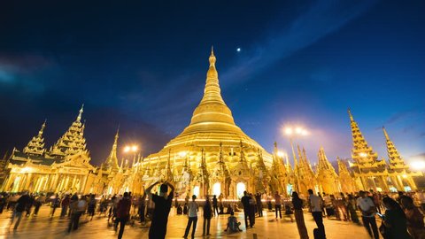 Shwedagon Pagoda, time lapse view of famous Buddhist landmark at night-time in Yangon, Myanmar (Burma). 