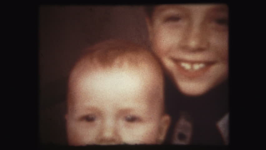 Concept family love and loving relationship two brothers. Vintage 8 mm film screen with 4 x 3 ratio | Shutterstock HD Video #23997403