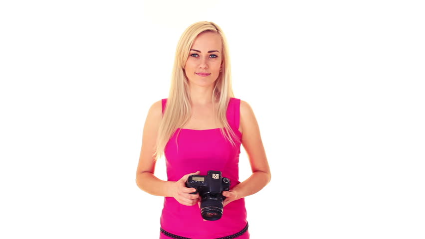 young blonde woman with professional photo camera