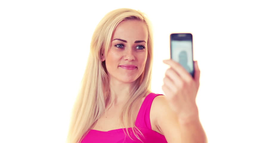 young blonde woman taking photos of yourself by mobile phone