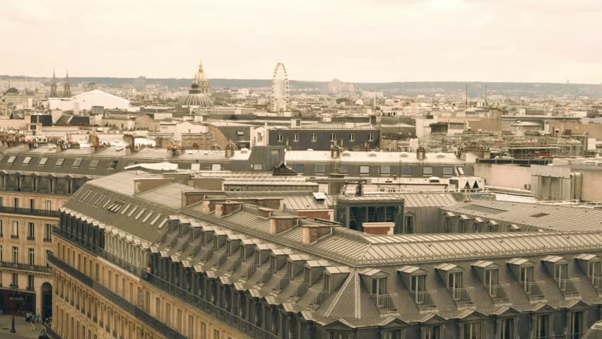 Paris roofs. Beautiful roofs view in Paris City downtown with skyline under sunlight at day time.
