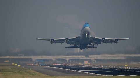 SCHIPHOL, AMSTERDAM, THE NETHERLANDS - FEBRUARY 13: A KLM Boeing 747 plane is taking off from the runway on February 13, 2017 in Schiphol, Amsterdam, the Netherlands.