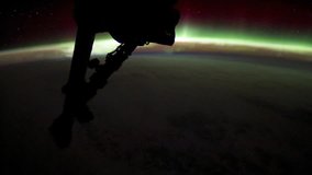Aurora Australis Across, Image taken from Time lapse sequence, have been color corrected, de-noised and edited from Public Domain images, courtesy of NASA Johnson Space Center.