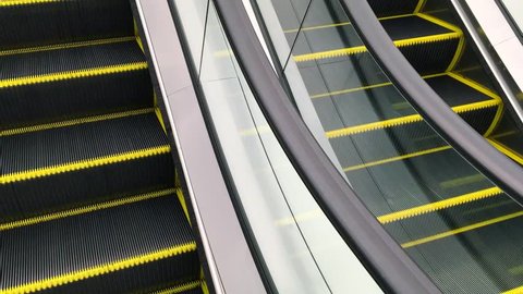 Moving Stairs Empty Escalator Up and Down in the Shopping Mall. Closeup HD slowmotion.