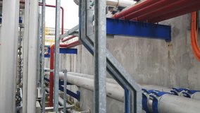Hot stream pipe line with insulation in process area of chemical refinery plant , Smooth video panning