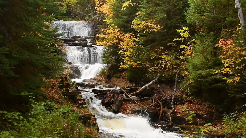 Looping footage features Sable Falls, an especially beautiful waterfall, shot with autumn color at Pictured Rocks National Lakeshore in Upper Peninsula of Michigan not far from Grand Marais.