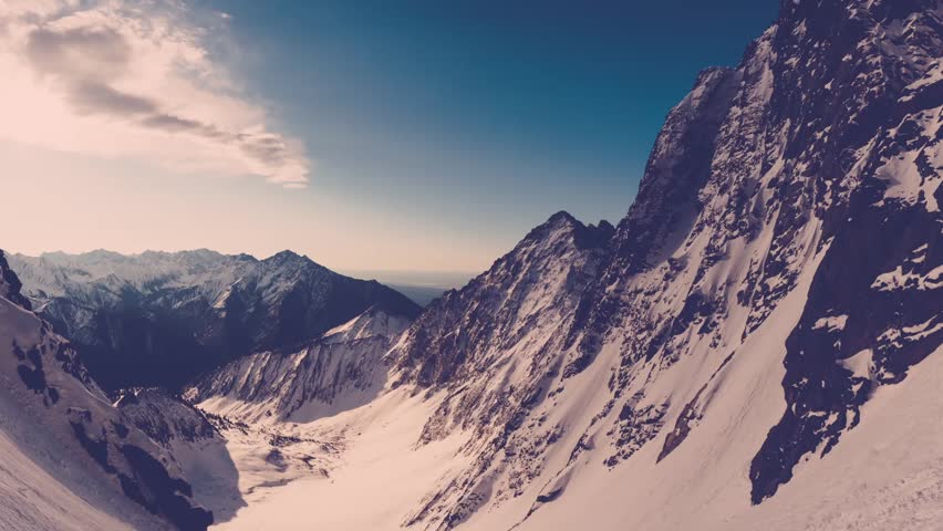 Winter landscape of mountains. Snow-covered mountains. Beautiful mountain landscape. | Shutterstock HD Video #24048985