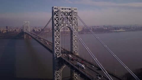 flying alongside George Washington Bridge towards New York City